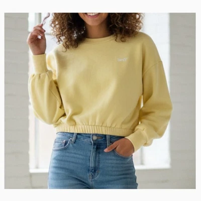 Sudadera corta para mujer Levi’s amarilla suave y elástica - talla pequeña Foto 1 de 4