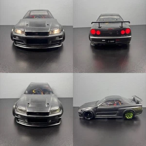 Scocca carrozzeria auto 1/10 RC con mod luce per Nissan Skyline GTR R34 (solo guscio) - Foto 1 di 15