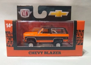 M2 Machines 1974 Chevy K5 Blazer 4X4 Squarebody DieCast Truck 1:64 orange  - Bild 1 von 9