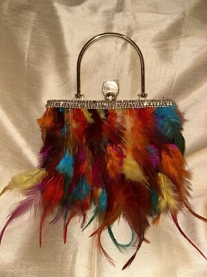 Cartera multi plumas Foto 1 de 4