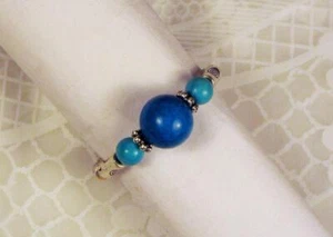 ANILLO ELÁSTICO CYNTHIA LYNN "SAN JOSE" AZUL VERDE TURQUESA CON CUENTAS PLATA - Imagen 1 de 1