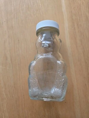 Banco de monedas con forma de oso de vidrio vintage de los años 50 de aproximadamente 5 pulgadas de alto Foto 1 de 4