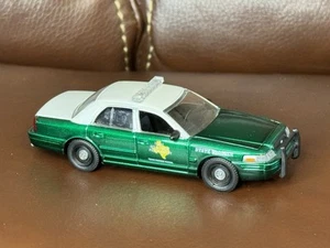 Greenlight 1/64 Crown Victoria Police Texas State Trooper DPS Green Machine - Picture 1 of 5