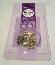 12 small brass picture hooks with pins brand new