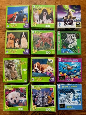 12 Jr. Puzzles 100 Pieces Each Complete Cute Animals, 4 Glow in the Dark - Image 1 of 4