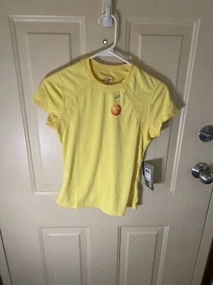 Camisa de entrenamiento amarilla XS de ASICS para dama Foto 1 de 3