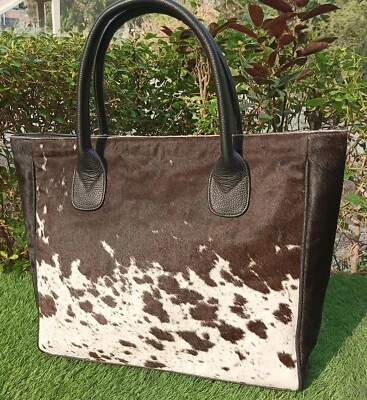 Bolso de mano para mujer de cuero genuino con estampado de animales de vaca Foto 1 de 2