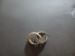STERLING SILVER EARRINGS 1.25"L BY .5"W WITH ETCHING - Picture 1 of 3