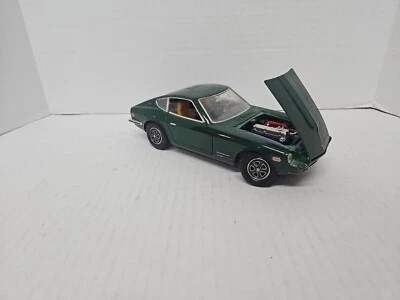 die cast metal car 1/18 Datsun 240z Missing Both Wipers and The Back Hatch Rare - Image 1 of 4