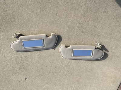 2003-2007 Saturn Ion Driver & Passenger Side Sun Visor Set Pair Beige Cloth - Image 1 of 4