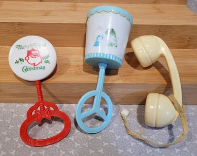 Juego de sonajero musical vintage de teléfono de dinosaurio de Navidad para bebé de Hong Kong Foto 1 de 4