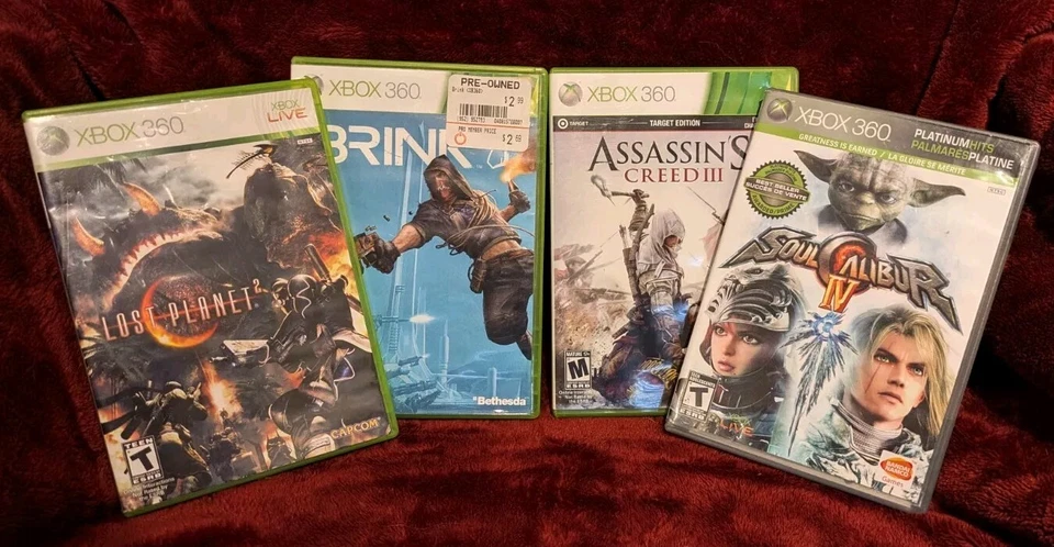 Assassin's Creed III, Soul Caliber IV, Lost Planet 2 & Brink for Xbox 360 Bundle - Image 1 of 2