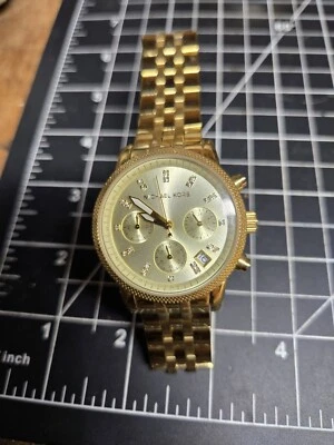 Reloj para dama Michael Kors Ritz tono dorado acero cronógrafo esfera champán MK5676 Foto 1 de 4