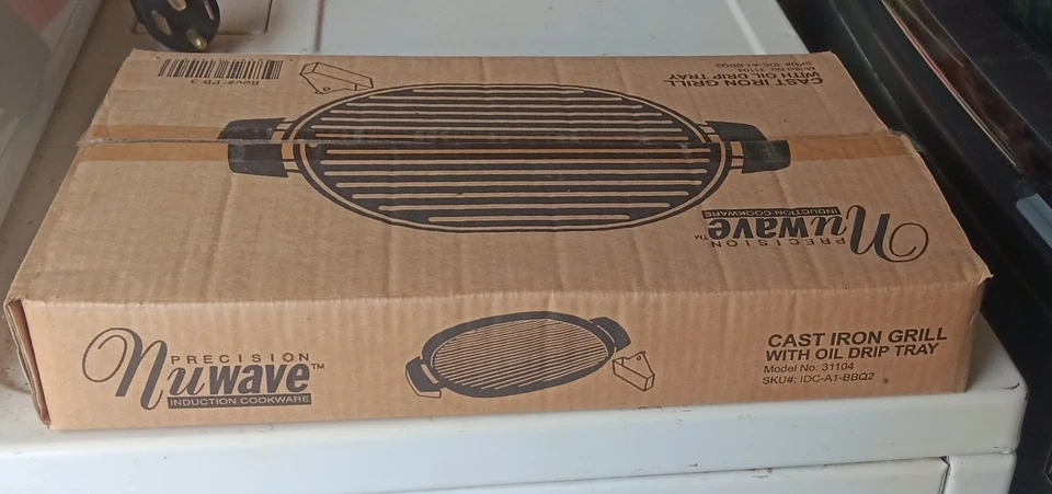 Parrilla de hierro fundido con bandeja de aceite Foto 1 de 1