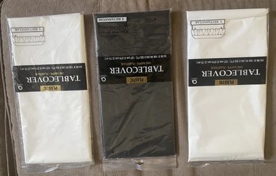 3 Plastic AMSCAN Table Cloths 54”x108” Two White, One Black - Image 1 of 4