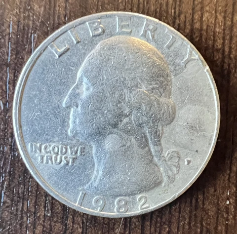 ERROR 1982 P QUARTER SPITTING EAGLE, ERROR UNDER EAGLE'S NECK AND OFSET OBVERSE Cover