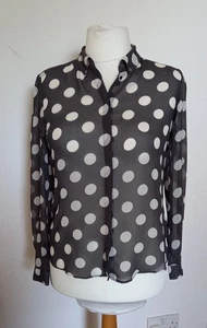 Blusa de gasa a lunares con botones talla 12 negra con grandes manchas blancas Siguiente - Imagen 1 de 6