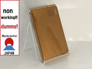【Factice !】 TOSHIBA W55T (couleur or) au-japon téléphone portable qui ne fonctionne pas - Photo 1 sur 3