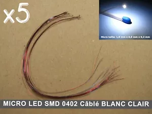 Pack 5pcs MICRO LED SMD 0402 BLANC CLAIR câblé 12V + R 1KΩ MODELISME JOUEF LIMA - Foto 1 di 3