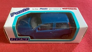 FIAT PUNTO METALLO IN BOX 1:43 BLU Bburago per lettori TOPOLINO Disney - Foto 1 di 6