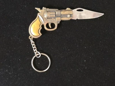 Llavero de pistola de bolsillo de metal de colección Foto 1 de 4