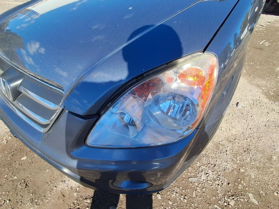 2005 Honda CR-V Driver Left Headlight Assembly OEM Used 3717094 - Image 1 of 4