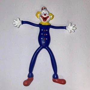 Vintage biegsame Clown Spielzeugfigur von Russ in blau & rot Kostüm 6" biegsam 1990er Spielzeug - Bild 1 von 7