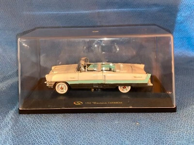 Signature 1955 White Packard Caribbean with Case Diecast Car 1:32 - Image 1 of 4