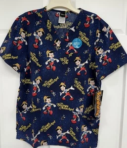 NWT Disney Tooniforms Cherokee Pinocchio Scrub Top Men’s S Blue Uniform Nurse - Picture 1 of 7