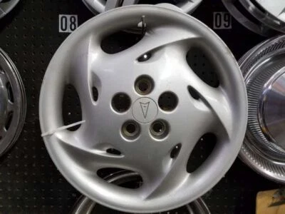 95 96 97 98 CUBIERTA RUEDA GRAND AM 15 RUEDAS 5850 Foto 1 de 2