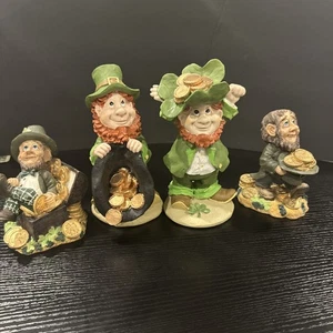 A lot of 4 leprechaun figures with their pot of gold St. Patrick’s Day - Picture 1 of 11