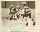 1983 Press Photo Bartlett ice hockey player against two East players in action