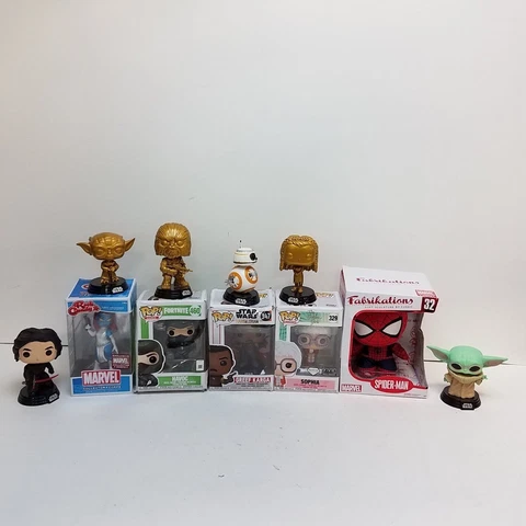 Bundle of 11 Funko Action Figures - Star Wars, Golden Girls, Marvel & Fortnite Cover