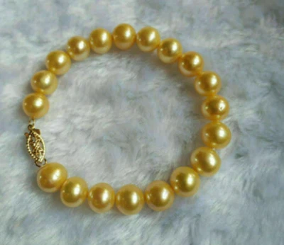 stunning 7.5-8" AAA+ 9-8mm natural south sea gold pearl bracelet 14k Gold - Image 1 of 4
