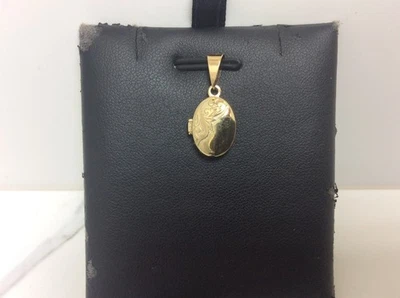 Ladies 10k Yellow Real Gold Oval opening Locket Charm Pendant  1.20 grams - Image 1 of 4
