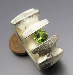 MATURE DESIGN - DISTINCTIVE PERIDOT TENSION RING - UNIQUE FROM OWN GOLDSMITH - Picture 1 of 6