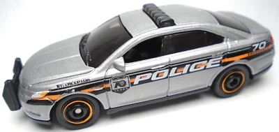 2023 MATCHBOX FORD POLICE INTERCEPTOR 70 YEARS SILVER 1:70 DIECAST 3" POLICE CAR - Image 1 of 4
