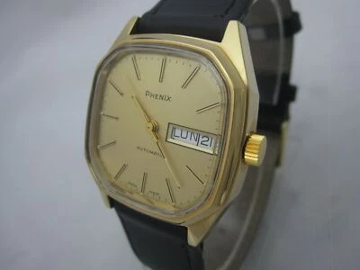 NOS NEW SWISS VINTAGE AUTOMATIC RARE PHENIX MENS ANALOG WATCH WITH DAY AND DATE - Image 1 of 3