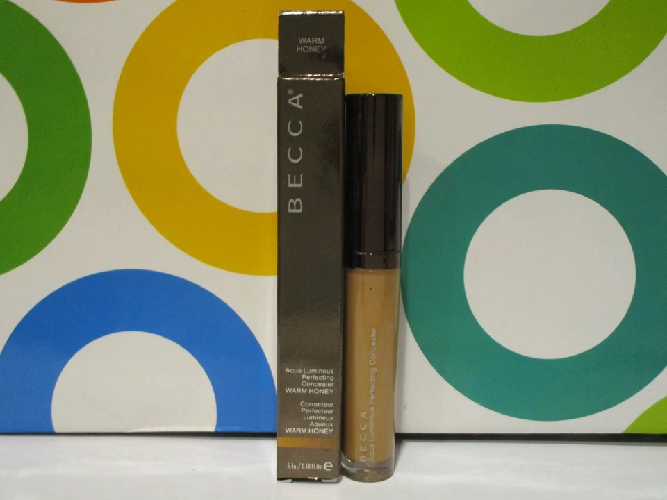 BECCA ~ CORRECTOR PERFECCIONADOR LUMINOSO AQUA ~ MIEL CÁLIDA ~ 0,18 OZ Foto 1 de 1