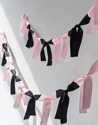 Bow Knot Garland | 6ft Linking Satin Banner with 6ft, Pink & Black  - Image 1 of 4