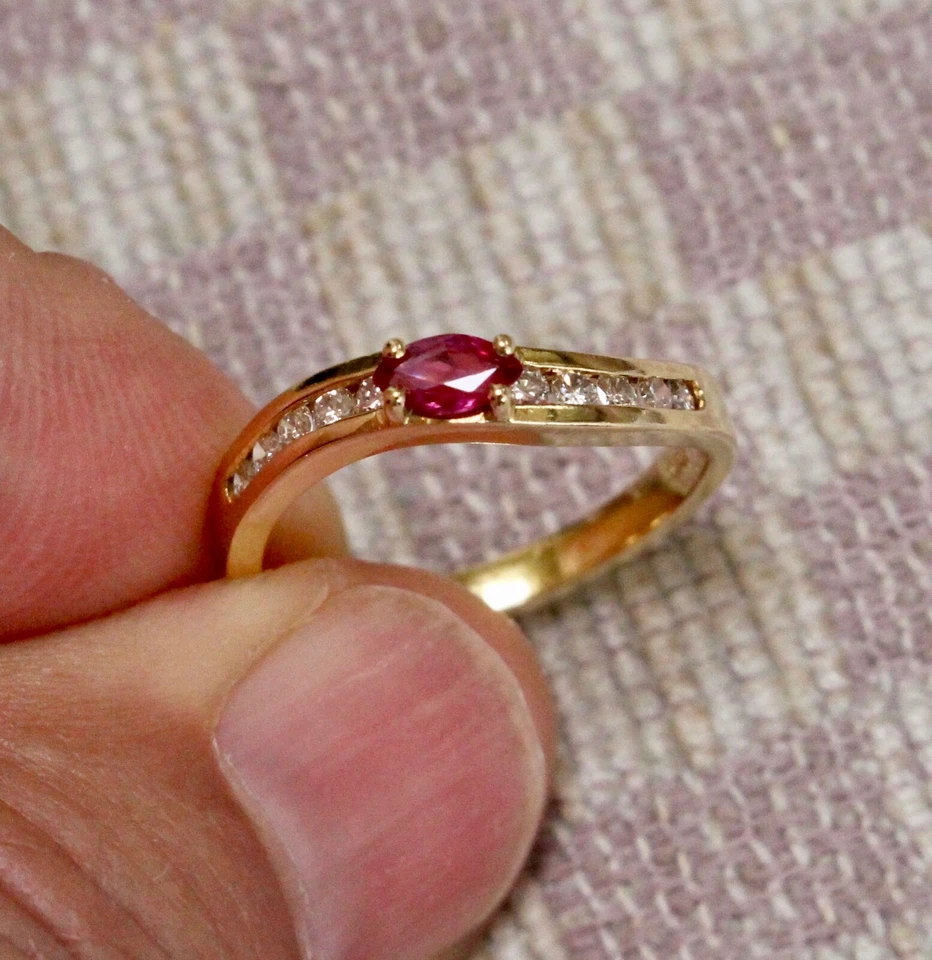 ESTATE EIGHTEEN KARAT YELLOW GOLD .50ct RUBY & DIAMOND BAND RING (size 6.5) - Image 1 of 1