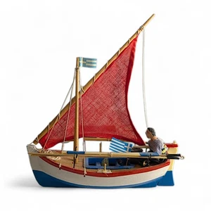 Modellino Barca a Vela in Legno - Un colorato rosso bianco e blu con 1 vela triangolare - Foto 1 di 13