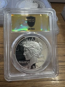 2023-S Proof Peace Silber Dollar PCGS PR-70DCAM Ultra Breaks GOLD RUSH - Bild 1 von 2