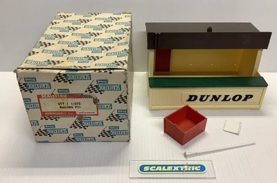 CREMA SCALEXTRIC TRI-ANG AÑOS 60 A202 DUNLOP PIT STOP EDIFICIO/GARAJE 1,32 EN CAJA - Imagen 1 de 4