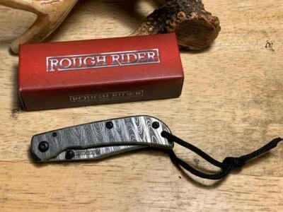 Navaja de bolsillo Rough Rider imitación acabado Damasco bloqueo de marco con clip de bolsillo de 3" RR1981 Foto 1 de 4