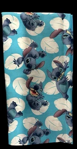 Disney The Many Faces of Stitch - From Lilo & Stitch fabric - Picture 1 of 2