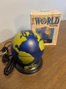 Téléphone vintage monde - Photo 1/5