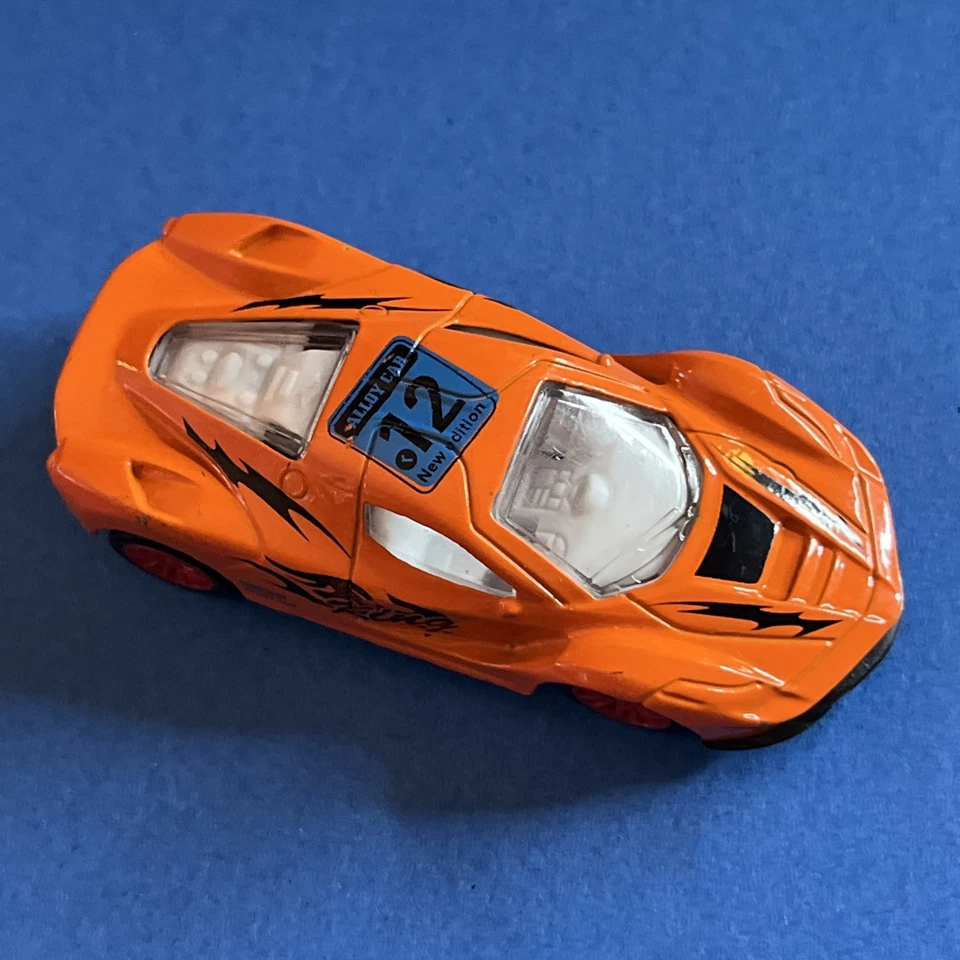 MACCHININA AUTO MODELLINO - 7 X 3 CM - N. 12 ARANCIONE ALLOY CAR - Immagine 1 di 4