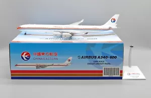 China Eastern A340-600 Reg: B-6052 JC Wings scala 1:200 pressofuso XX20123 - Foto 1 di 11