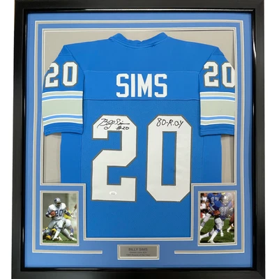 Camiseta deportiva enmarcada autografiada/firmada Billy Sims 80 ROY 33x42 azul Detroit certificado de autenticidad JSA Foto 1 de 3